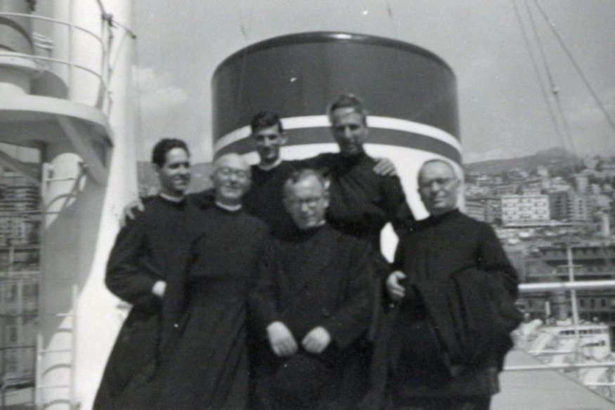 Group of Jesuits on a ship deck - Historical Archives - Jesuits, Euro-Mediterranean Province